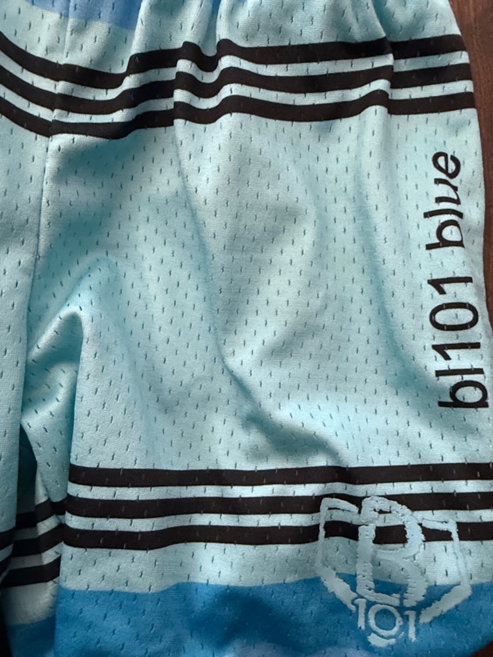 b101 blue Athletic Shorts with Black Stripes
